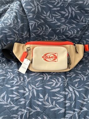 NWT: Coach Men’s Beige and Orange Logo Belt Bag